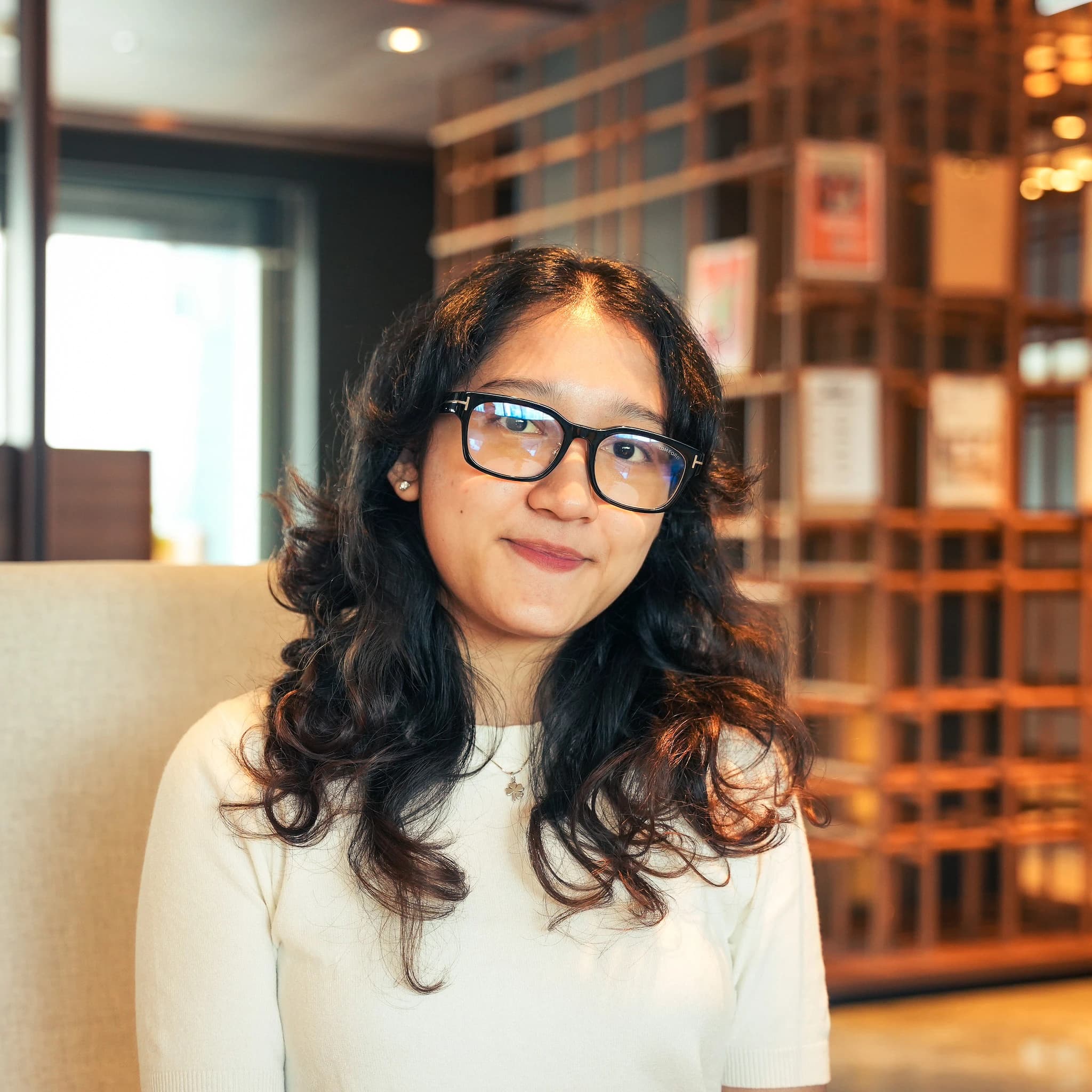 Win Ma Ma Khin smiling, intern at Issa Compass