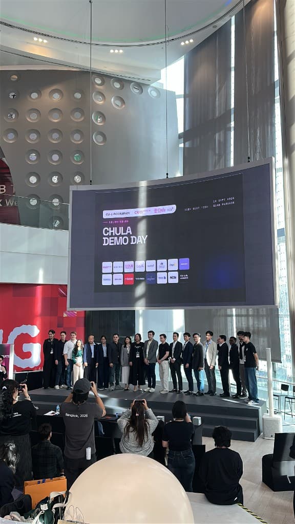 Founders on stage under the Chula Demo Day screen at SCBX NEXT TECH, Bangkok